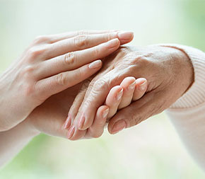 palliative care specialist assuring elderly patient